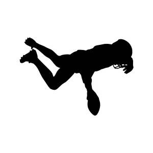 Silhouette Football Player in Mid-Air